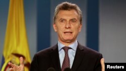 FILE - Argentina's President Mauricio Macri speaks during a news conference after the bilateral meeting at Narino Palace in Bogota, Colombia, June 15, 2016.