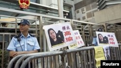 Ảnh bà Cao Du trong một cuộc biểu tình đòi phóng thích bà khỏi nhà tù vào ngày 17/4/2015.