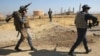 Thousands Flee as Iraqi Forces Advance in Kirkuk 
