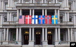 In preparation for the visit of Nordic leaders to the White House, flags are displayed on the Eisenhower Executive Office Building on the White House complex in Washington, May 12, 2016.