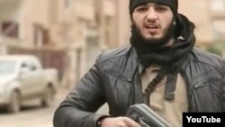 A YouTube screen grab of an IS Russian-language propaganda video shows an armed militant calling on would-be jihadists to join the group. According to the Russian government, more than 4,000 Russian citizens have traveled to Iraq and Syria to fight in various jihadist groups.