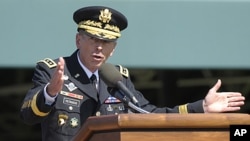 Former Commander of International Security Assistance Force and US Forces-Afghanistan General Davis Petraeus speaks during an armed forces farewell tribute and retirement ceremony at Joint Base Myer-Henderson Hall in Arlington, Virginia, August 31, 2011.