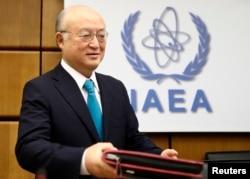 International Atomic Energy Agency (IAEA) Director General Yukiya Amano arrives for a board of governors meeting at the IAEA headquarters in Vienna, Nov. 20, 2014.