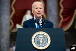 President Joe Biden speaks from Statuary Hall at the US Capitol, Thursday (6/1).