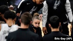 Hammon became the first woman to direct an NBA team, taking over the Spurs after coach Gregg Popovich was ejected. (AP Photo/Eric Gay)