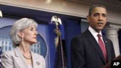 President Barack Obama, accompanied by Health and Human Services Secretary Kathleen Sebelius, announces the revamp of his contraception policy requiring religious institutions to fully pay for birth control, Feb. 10, 2012 at the White House.