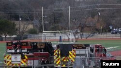 Emergency responders are seen near a synagogue where a man has reportedly taken people hostage during services in Colleyville, Texas, Jan. 15, 2022. 