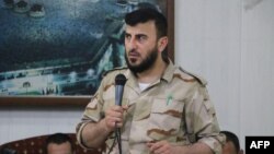 Zahran Aluš, lider Islamske armije, sirijske pobunjeničke grupe, prilikom govora na svadbi jednog od svojih boraca