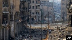 Quang cảnh hoang tàn sau trận chiến giữa quân nổi dậy Syria và quân chính phủ Syria ở Aleppo, Syria, 4/9/2013. (AP Photo/Aleppo Media Center, AMC)