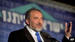 Israeli Foreign Minister Avigdor Lieberman speaks at a conference of his political party in Jerusalem, April 13, 2011