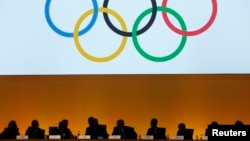 International Olympic Committee (IOC) delegates are seen during the IOC extraordinary session in Lausanne, Switzerland, July 11, 2017. 