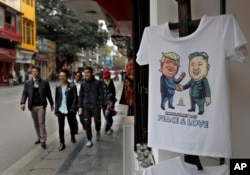 A T-shirt with images of U.S. President Donald Trump and North Korean leader Kim Jong Un is displayed at a tourist area in Hanoi, Vietnam, Feb. 24, 2019.