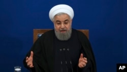 Iranian President Hassan Rouhani speaks during a news conference at the presidential compound in Tehran, Feb. 6, 2018.