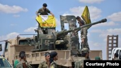 FILE - Soldiers participate in an operation to liberate Raqqa, Syria, from Islamic State militants, May 24, 2016. (Credit: ANHA)