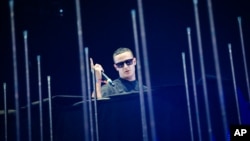 FILE - DJ Snake performs at the 2015 Coachella Music and Arts Festival.