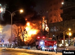 A view of a site of an explosion at a bar in Sapporo, Japan, Dec. 16, 2018 in this still image taken from a video obtained from social media.