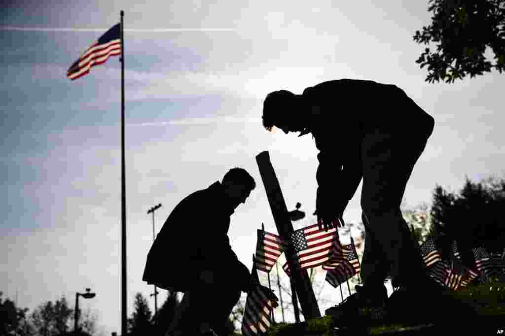 American flags are posted in the ground for a Veterans Day ceremony at the Vietnam War Memorial in Philadelphia, Pennsylvania.