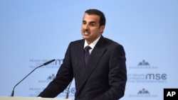 The Emir of Qatar, Sheikh Tamim bin Hamad Al Thani, delivers a speech at the International Security Conference in Munich, Germany, Friday, Feb. 16, 2018. 