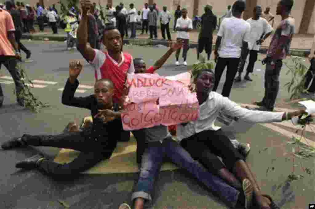 People protest on the second day of the ongoing strike following the removal of fuel subsidy by the government in Lagos, Nigeria, Tuesday, Jan. 10, 2012. As Nigeria's nationwide strike starts its second day, angry youths have erected a burning roadblock 