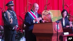 Suriname's President Desi Bouterse, re-elected to a second, five-year term, delivers his inaugural speech in Paramaribo, Aug. 12, 2015. 