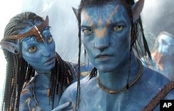 Zoe Saldana and Sam Worthington in scene from Avatar