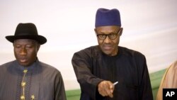 Rais anayeondoka madrakani Goodluck Jonathan, na rais aliyeshinda uchaguzi nchini Nigeria Muhammadu Buhari