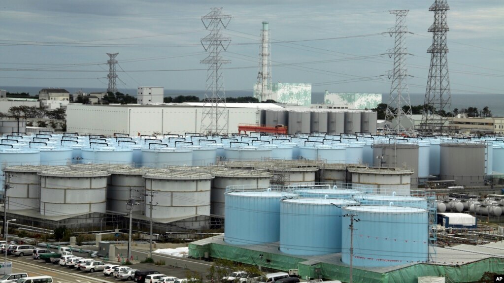 This Oct. 12, 2017, photo, shows tanks holding contaminated, treated but still slightly radioactive, water at the wrecked Fukushima Dai-ichi nuclear plant in Okuma, Fukushima Prefecture, northeast of Tokyo. (Pablo M. Diez/Pool Photo via AP)