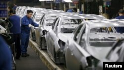 FILE - A worker works at an assembly line of Hyundai Motor's plant in Asan, South Korea, Jan. 27, 2016.