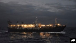 The Chinese-flagged Lu Rong Yuan Yu 609 prepares to fish for squid on the high seas near the Galapagos Islands on July 19, 2021.