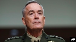 FILE - Joint Chiefs Chairman Gen. Joseph Dunford listens on Capitol Hill in Washington while testifying. 