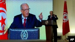 FILE - Tunisian President Beji Caid Essebsi gives a speech in Tunis, May 10, 2017. 