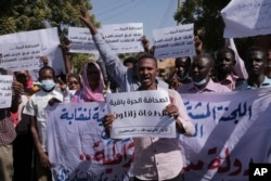 Sudanese journalist protest in Khartoum, Sudan, Nov.16, 2021. The placard in the middle reads: 'free press will remain, tyrants are fleeting.'