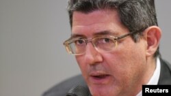 FILE - Brazilian Finance Minister Joaquim Levy said losing the investment grade rating was "serious" and showed the government had not done everything required. 