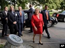 FILE - Chile's President Michelle Bachelet arrives to commemorate Chilean political figure and activist Orlando Letelier who was assassinated in 1976 by secret agents of the government of Chilean strongman Augusto Pinochet, June 23, 2009, in Washington.