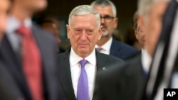 FILE - U.S. Secretary for Defense Jim Mattis arrives for a meeting of NATO defense ministers at alliance headquarters in Brussels, June 29, 2017.