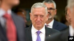 FILE - U.S. Secretary for Defense Jim Mattis arrives for a meeting of NATO defense ministers at NATO headquarters in Brussels on June 29, 2017.