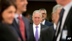 FILE - U.S. Secretary for Defense Jim Mattis arrives for a meeting of NATO defense ministers at NATO headquarters in Brussels, June 29, 2017.
