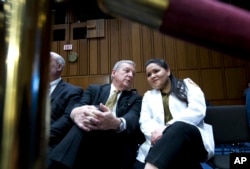Sen. Dick Durbin D-Ill., speaks with medical student Alejandra Duran from Chicago, during a hearing with Homeland Security Secretary Kirstjen Nielsen on Capitol Hill, Jan. 16, 2018, in Washington.