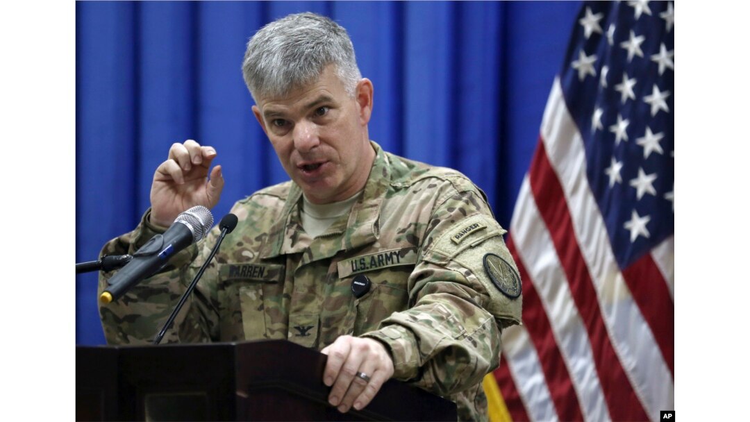 FILE - Col. Steve Warren speaks to reporters during a news conference at the U.S. Embassy in the heavily fortified Green Zone in Baghdad, Iraq.
