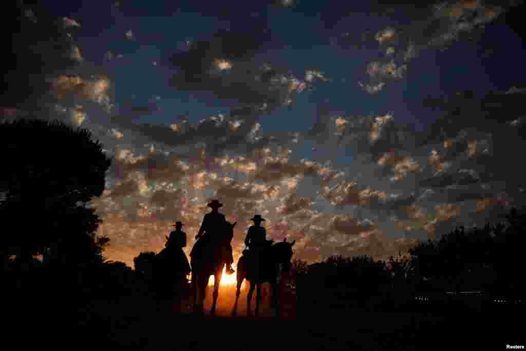 Pilgrims ride their horses during a pilgrimage at the shrine of El Rocio in Almonte, southern Spain.