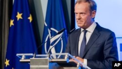 European Council President Donald Tusk addresses the media in Brussels, Belgium, July 10, 2018. 