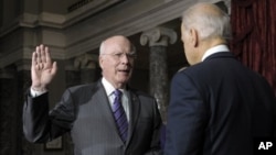 Vice President Biden, right, reenacts swearing in of Sen. Leahy, D-Vt., as President Pro Tempore of the Senate, Washington, Dec. 18, 2012.