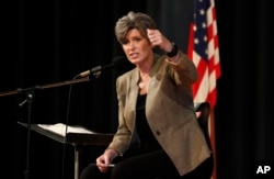 U.S. Sen. Joni Ernst, R-Iowa, reacts to a question during a town hall meeting, Sept. 21, 2017, in Charles City, Iowa.