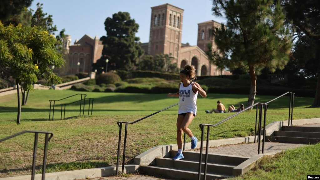 A woman jogs on the University of California Los Angeles (UCLA) campus in Los Angeles, California, U.S., on September 28, 2020. (REUTERS/Lucy Nicholson)