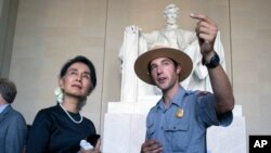 Myanmar leader Aung San Suu Kyi tours the Lincoln Memorial with National Park Service ranger Heath Mitchell in Washington, Sept. 14, 2016. 