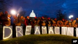 FILE - Demonstrators rally in support of Deferred Action for Childhood Arrivals (DACA) outside the Capitol, in Washington, Jan 21, 2018.