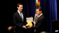 Mexican President Enrique Pena Neto (R) awards White House Senior Adviser Jared Kushner with The Order of the Aztec Eagle, the highest Mexican order awarded to foreigners, Nov. 30, 2018, in Buenos Aires, Argentina. 