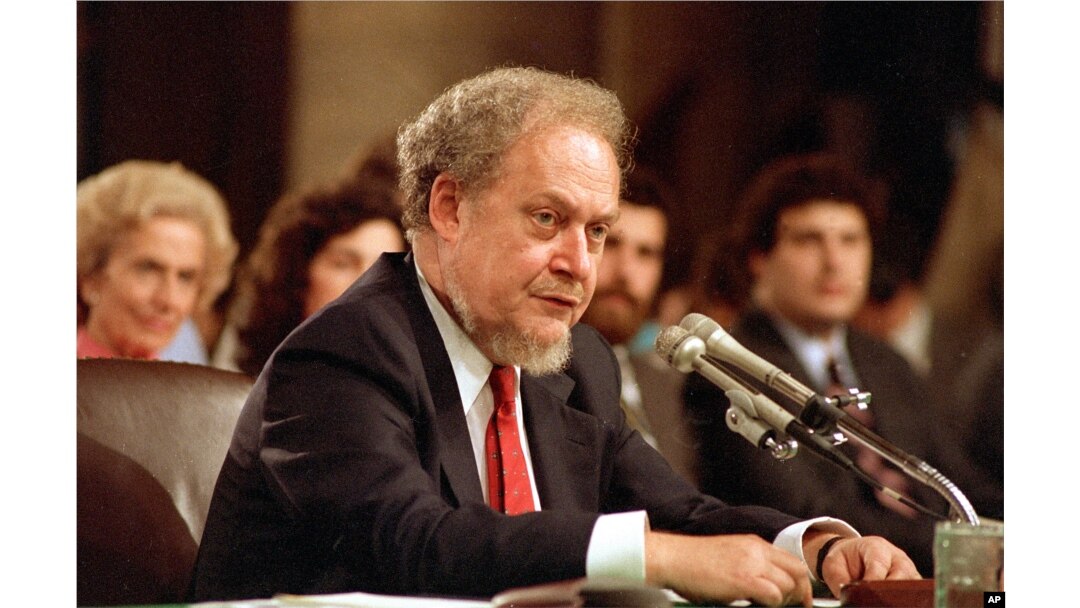 FILE - U.S. Supreme Court nominee Robert H. Bork testifies before the Senate Judiciary Committee during his confirmation hearings on Capitol Hill, Sept. 16, 1987.