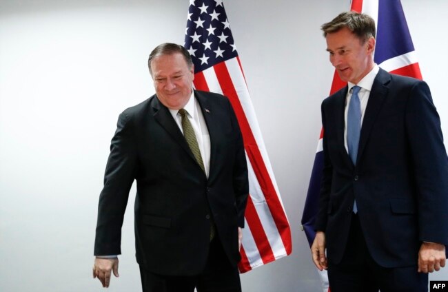 U.S. Secretary of State Mike Pompeo, left, poses with Britain's Foreign Secretary Jeremy Hunt at the European Council in Brussels, Belgium, May 13, 2019.