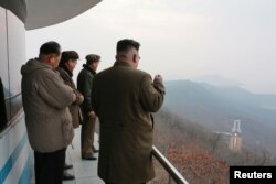 North Korean leader Kim Jong Un watched the ground jet test of a Korean-style high-thrust engine newly developed by the Academy of the National Defence Science in this undated picture provided by KCNA in Pyongyang, March 19, 2017.
